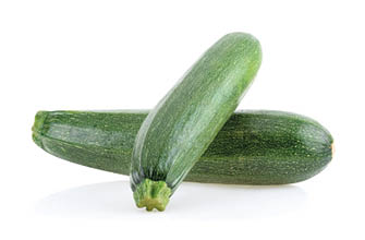 Fresh zucchini isolated on a white background.